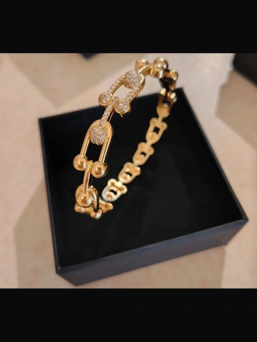 Goldtone bracelet.